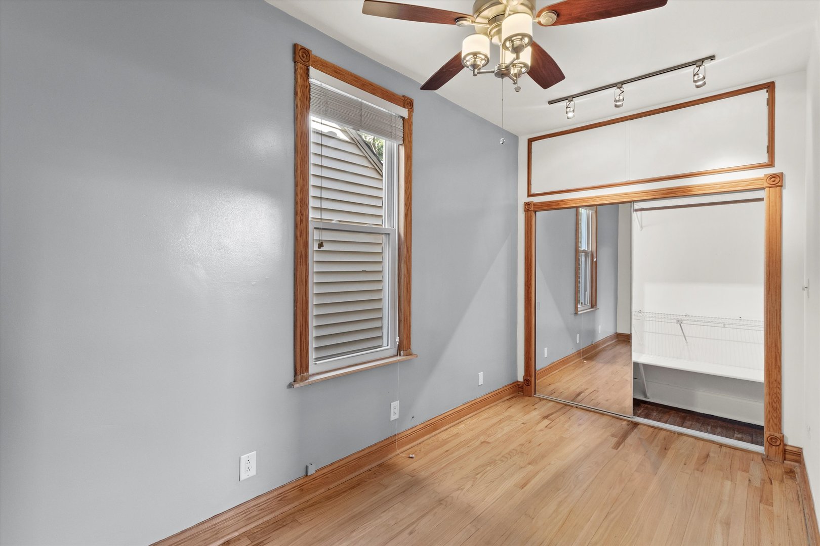 911 North Fairfield Avenue, Unit 2 Chicago, IL 60622 - Photo 35 of 43 a view of empty room with wooden floor and fan