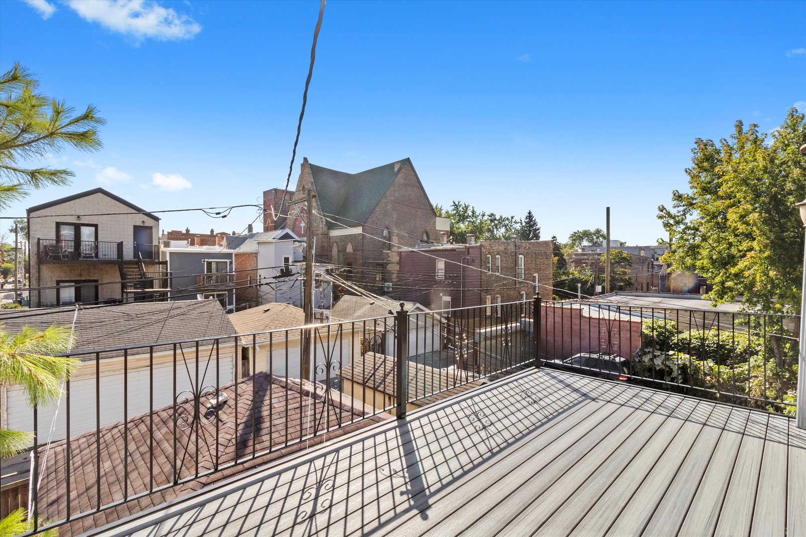 911 North Fairfield Avenue, Unit 2 Chicago, IL 60622 - Photo 5 of 43 a view of city from a balcony