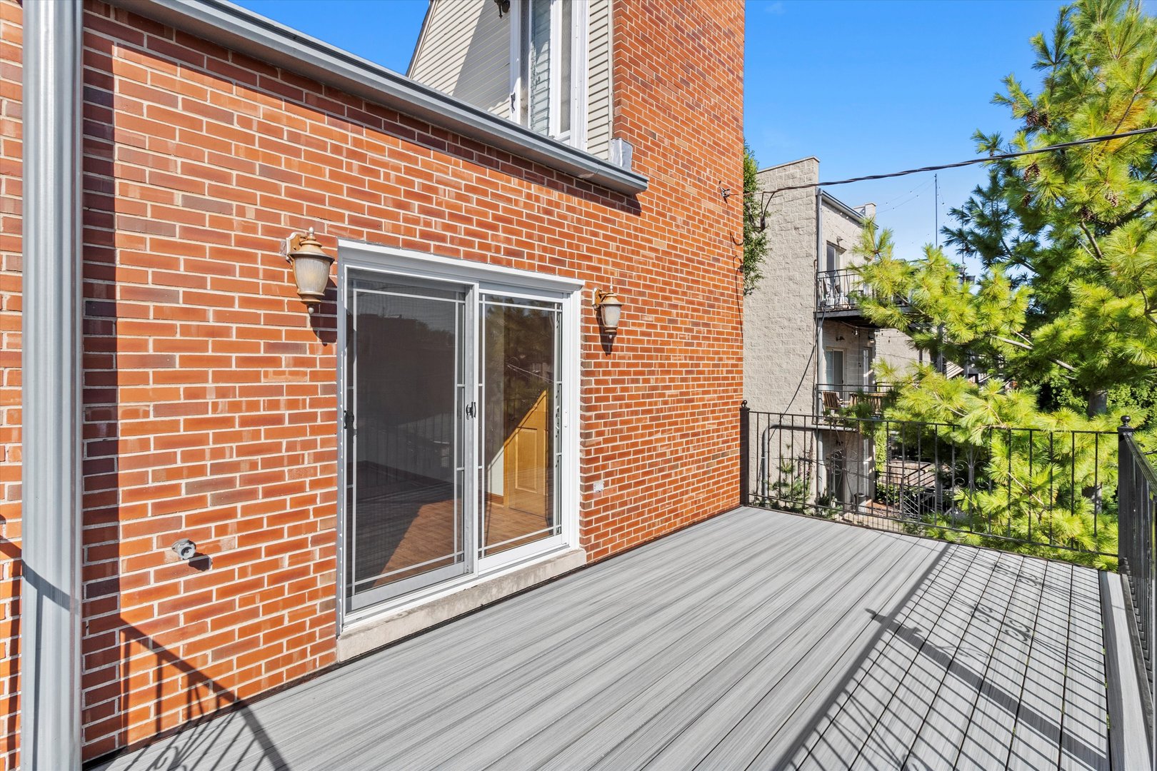 911 North Fairfield Avenue, Unit 2 Chicago, IL 60622 - Photo 6 of 43 a view of a brick house with a large window
