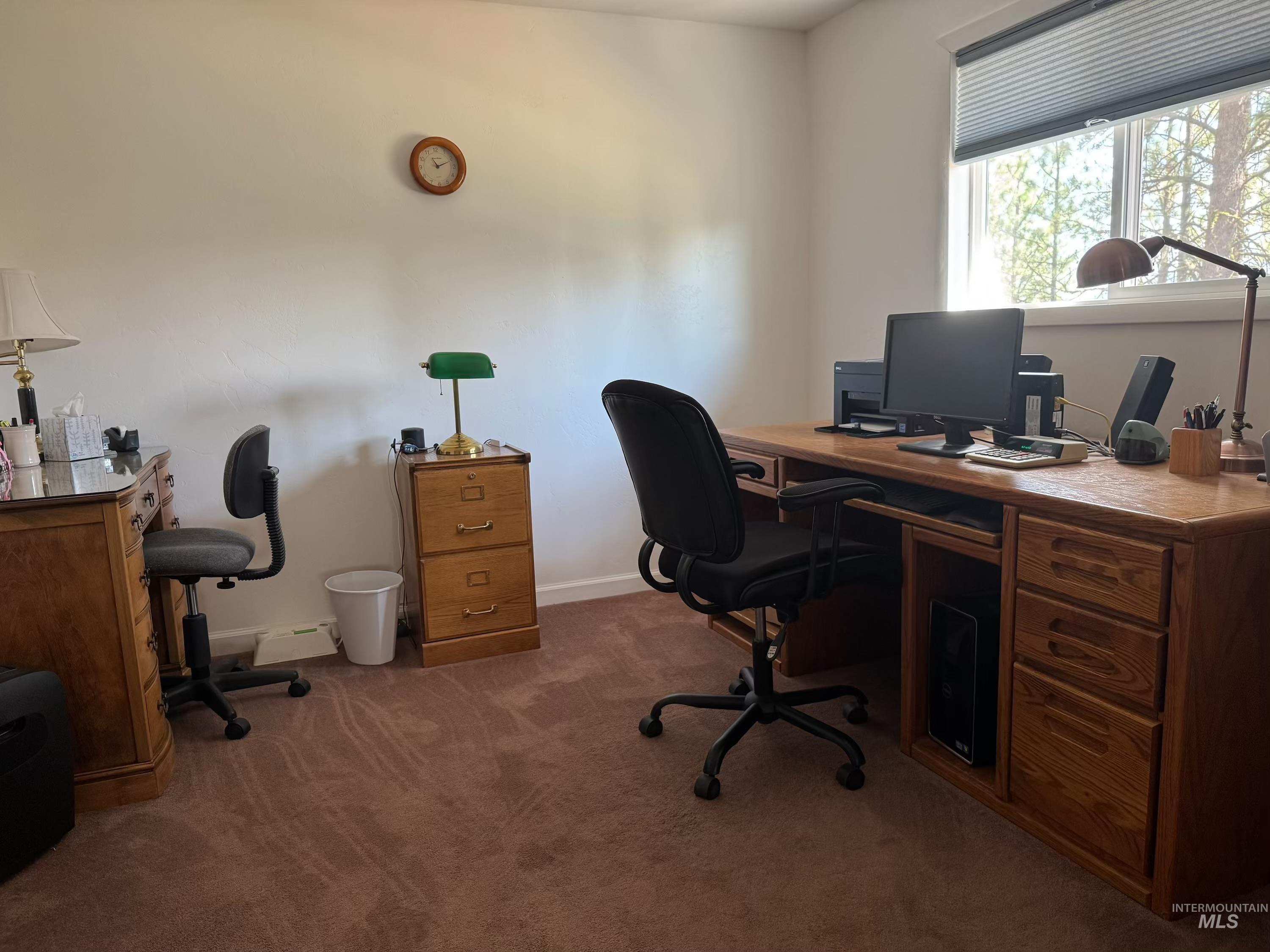 643 South Main Street Cascade, ID 83611 - Photo 15 of 38 Home office with dark colored carpet and baseboards