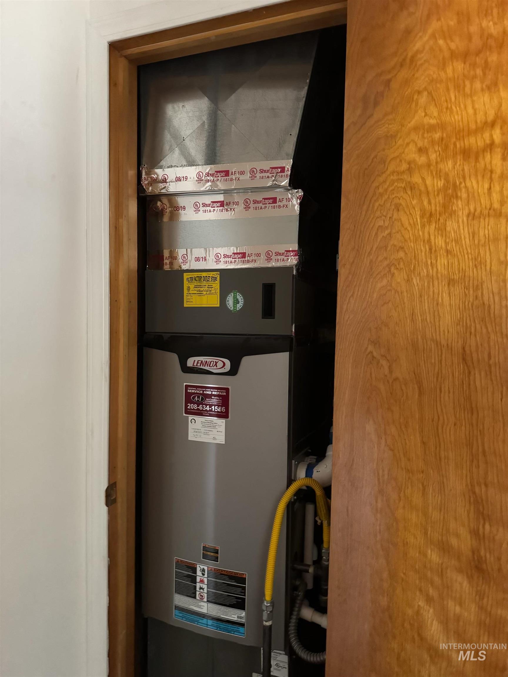 643 South Main Street Cascade, ID 83611 - Photo 23 of 38 Utility room featuring heating unit