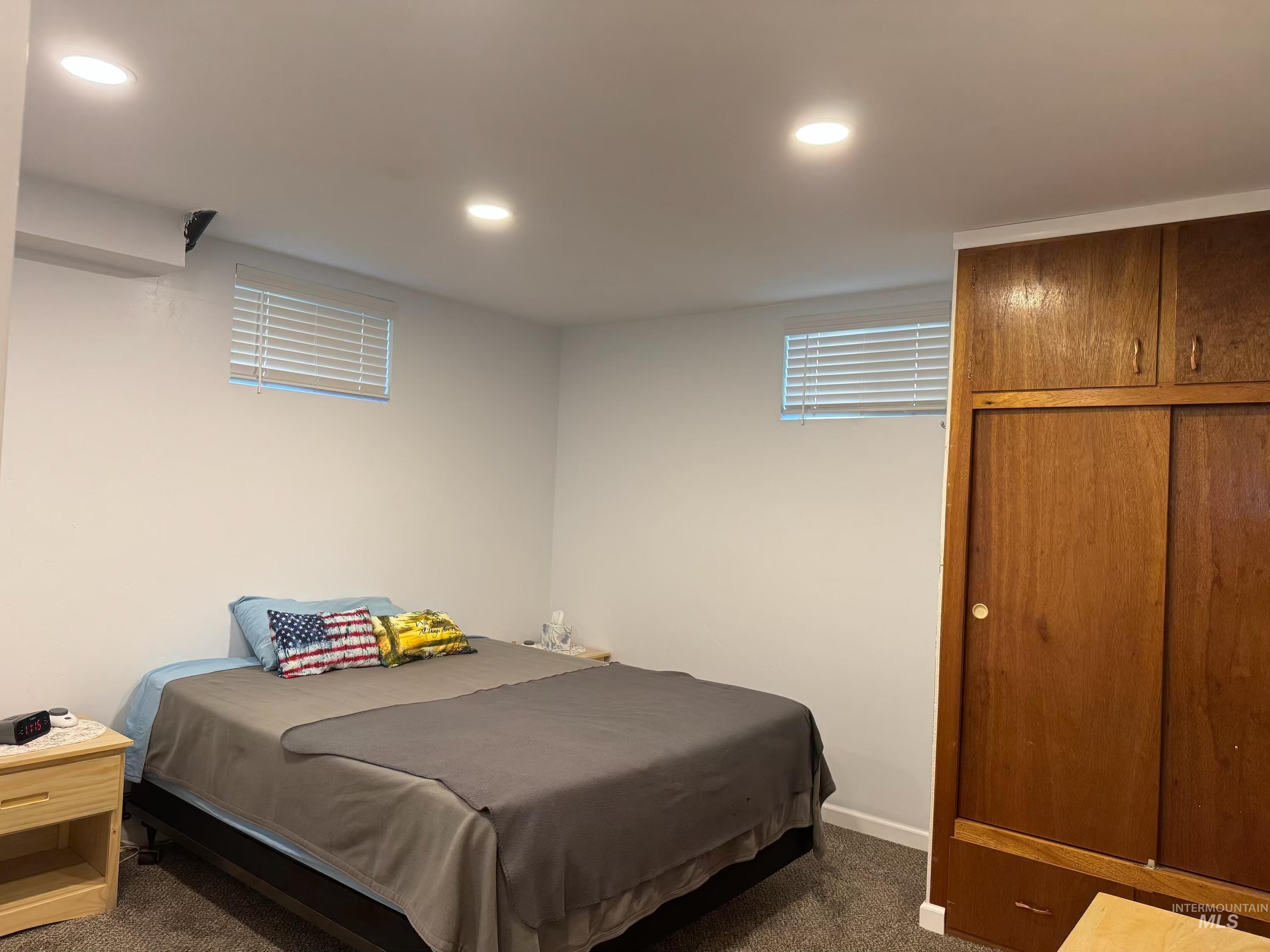 643 South Main Street Cascade, ID 83611 - Photo 27 of 38 Bedroom with dark colored carpet and recessed lighting