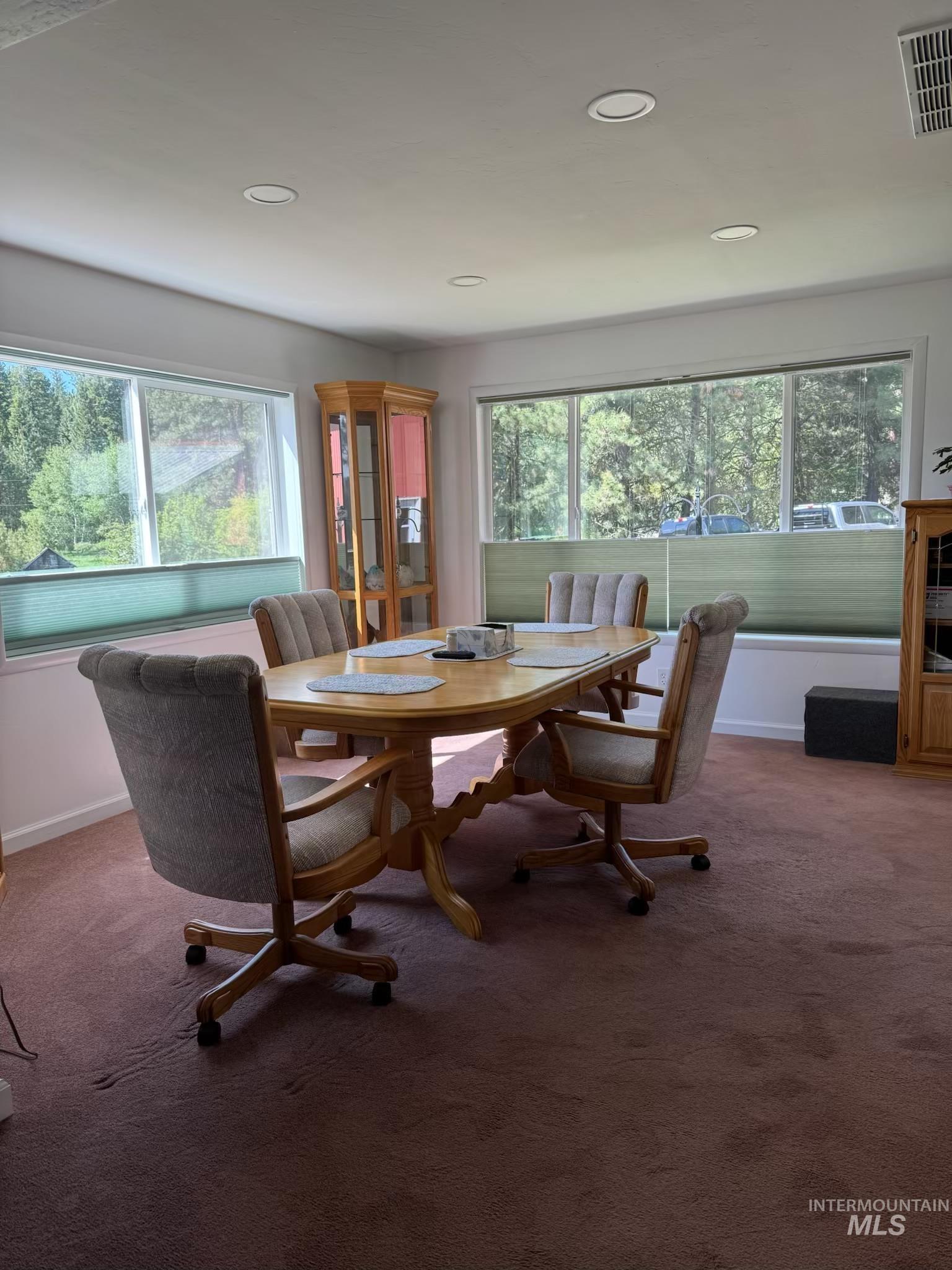 643 South Main Street Cascade, ID 83611 - Photo 9 of 38 Dining space featuring plenty of natural light, carpet, and recessed lighting