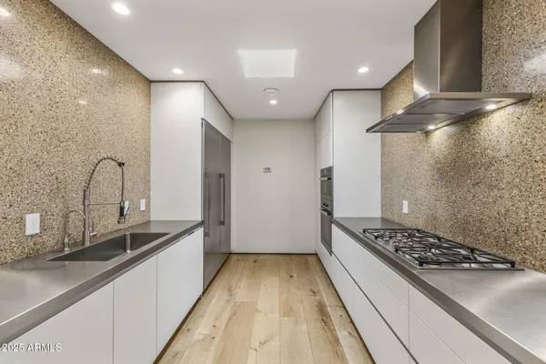 a dining room with a large window and table