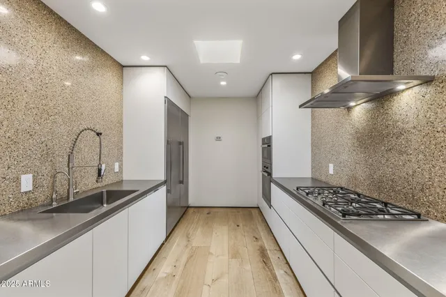 a dining room with a large window and table