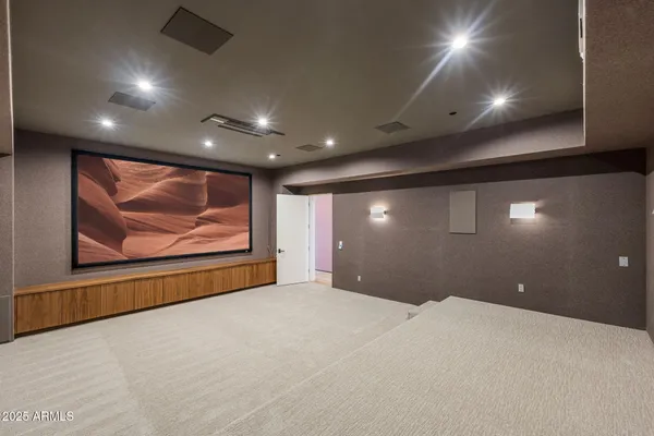 a view of a room that has a large window