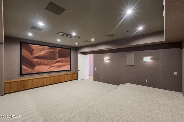 a view of a room that has a large window