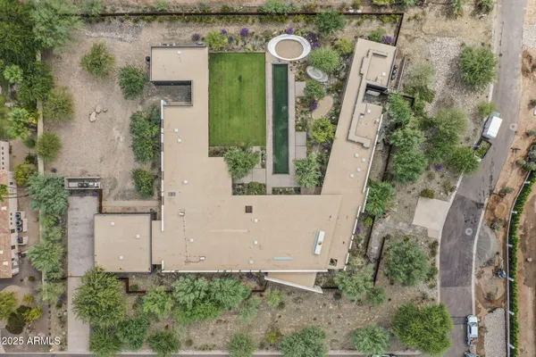 a view of swimming pool with outdoor seating
