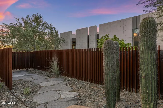 a view of swimming pool from a balcony