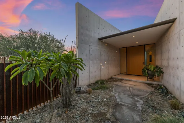 a view of a swimming pool with an outdoor space and seating area