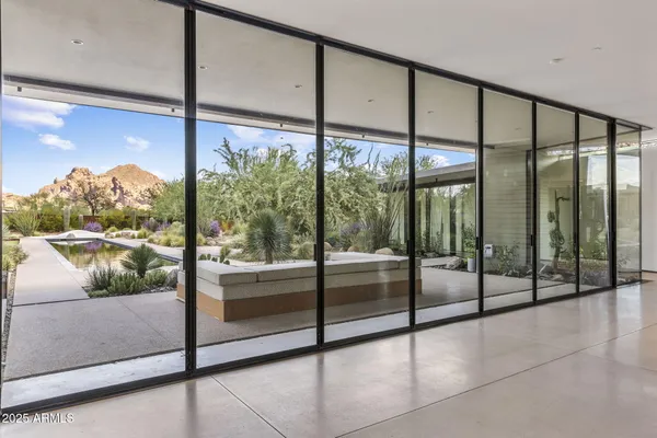 a view of a floor and a floor to ceiling window