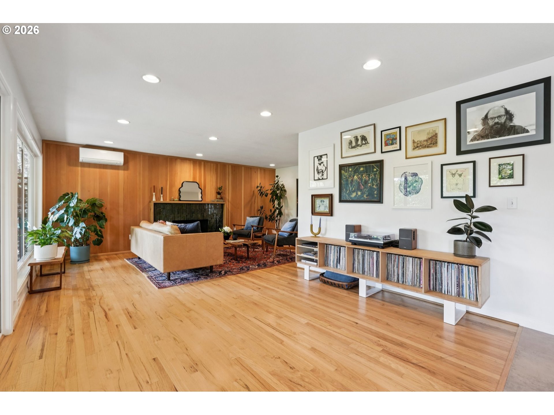 7225 Southwest 13th Avenue Portland, OR 97219 - Photo 11 of 48 a living room with furniture and a wooden floor