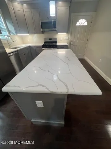a view of kitchen with stainless steel appliances
