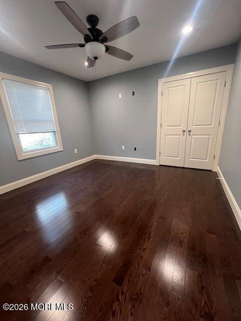 173 Jackson Mills Road Jackson, NJ 08527 - Photo 9 of 18 an empty room with wooden floor and windows