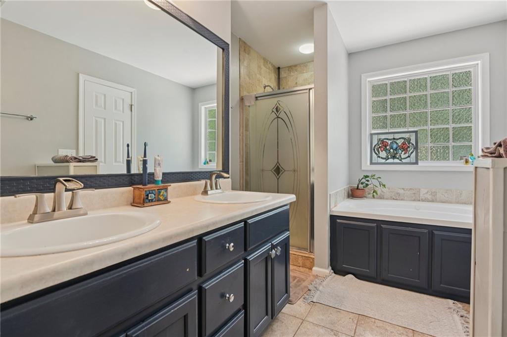 29 Wey Bridge Court White, GA 30184 - Photo 13 of 15 a bathroom with a sink and a mirror