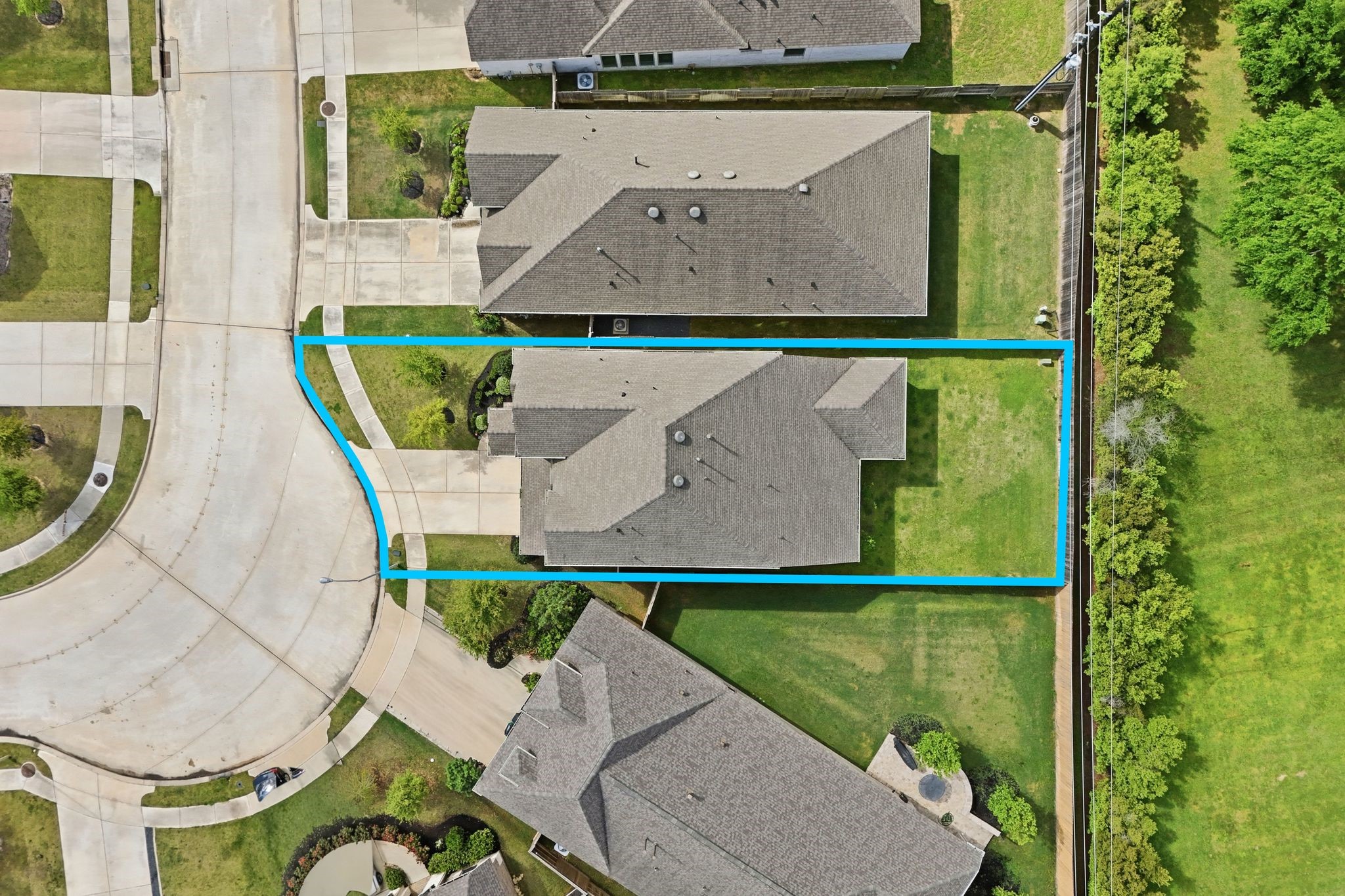 24423 Morningside Terrace Tomball, TX 77375 - Photo 29 of 47 an aerial view of a house with outdoor space