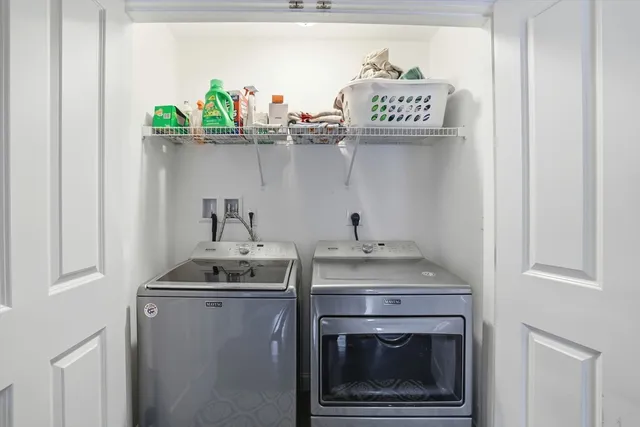 a kitchen with a stove and a microwave