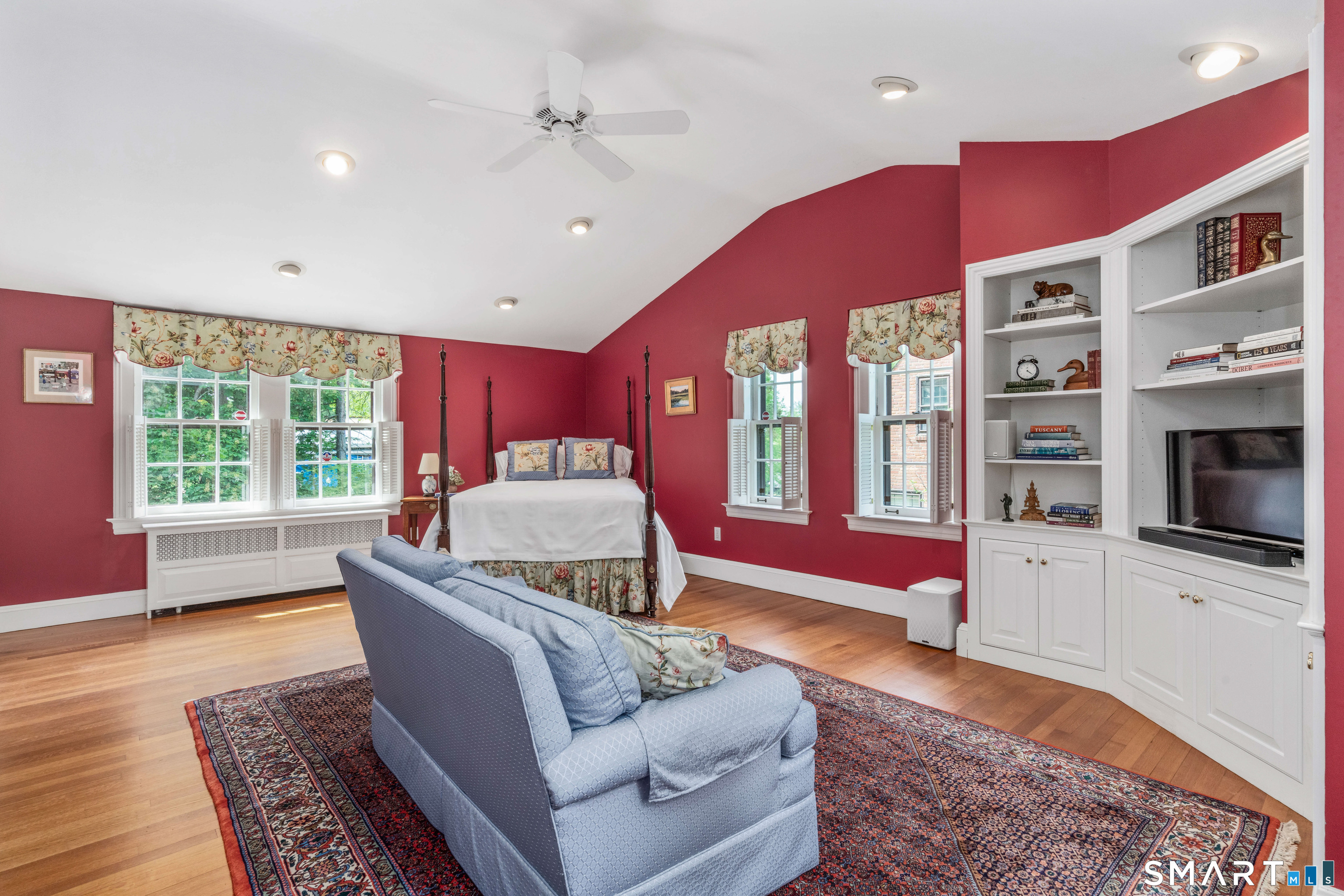 7 Fernwood Road West Hartford, CT 06119 - Photo 27 of 40 a living room with furniture and a flat screen tv