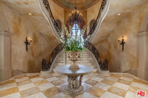 a vase of flowers sitting on a table