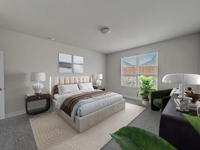 a kitchen with kitchen island stainless steel appliances a sink a stove a refrigerator and cabinets