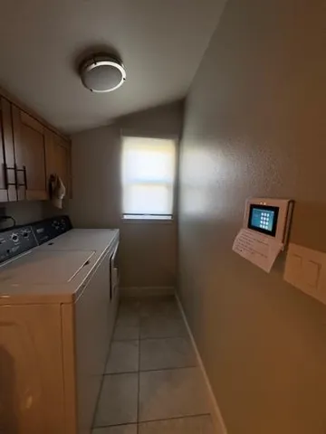 a kitchen with a cabinets and a stove top oven