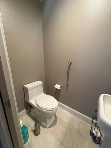 a bathroom with a toilet and a sink