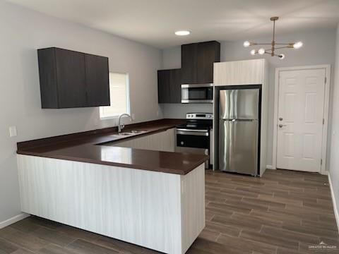 3400 Frio Avenue, Unit 1 McAllen, TX 78504 - Photo 2 of 7 a kitchen with granite countertop a refrigerator and a sink