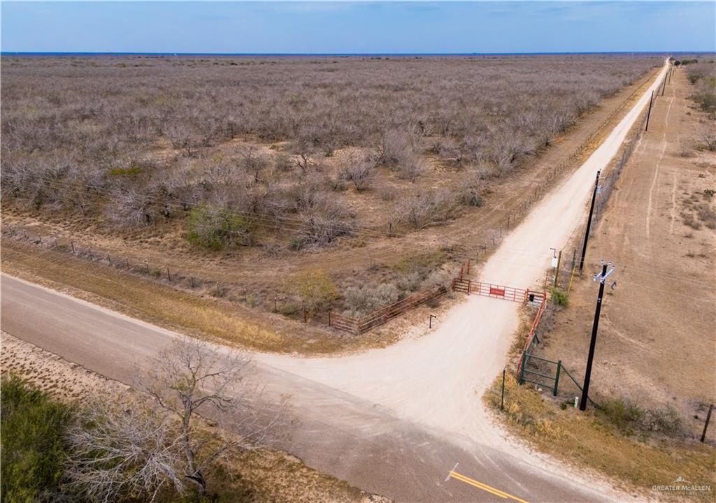 17391 Chapa Road Edinburg, TX 78542 - Photo 9 of 23 a view of a dry yard with wooden fence