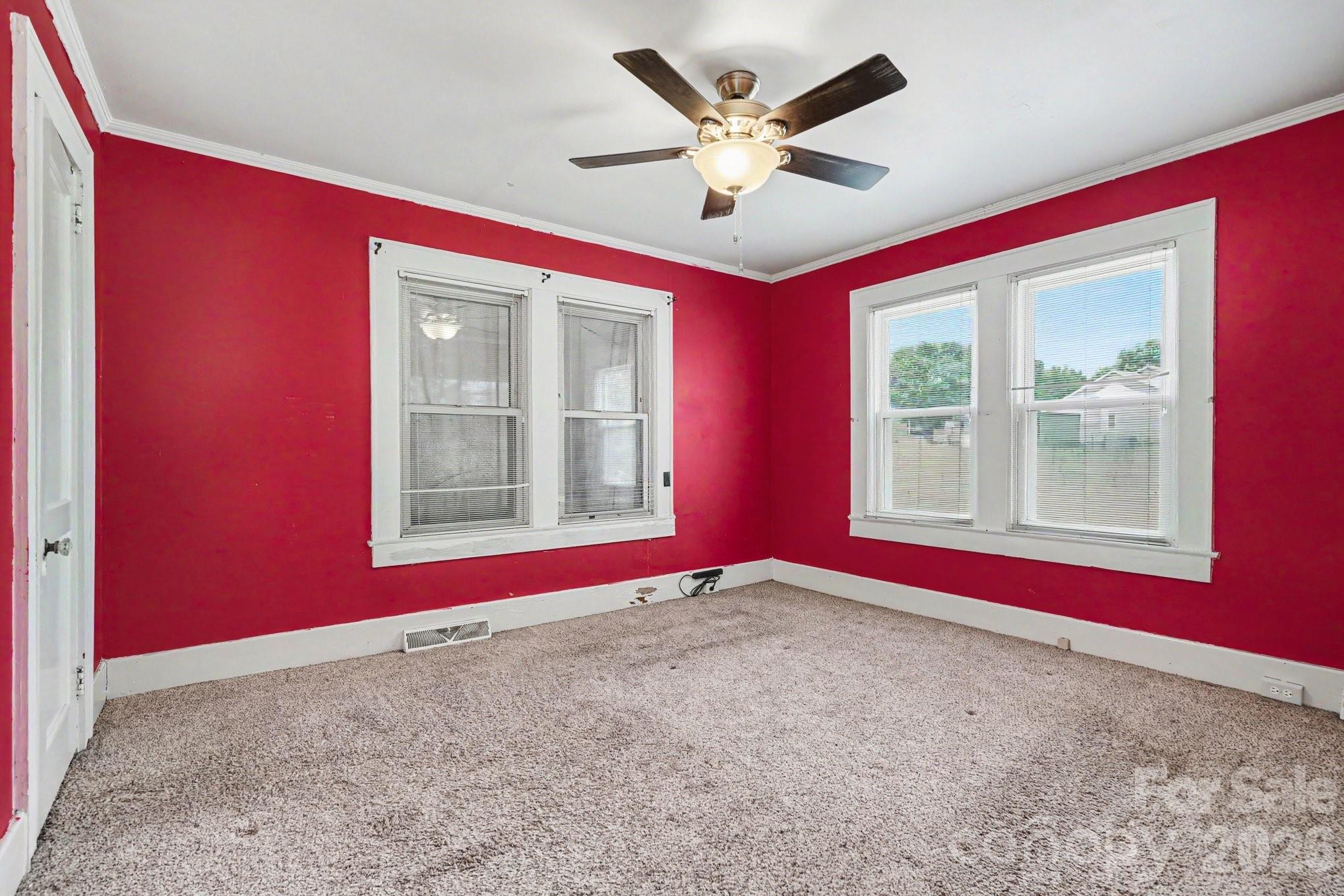 24359 Ridgecrest Road Locust, NC 28097 - Photo 11 of 26 a view of an empty room with windows