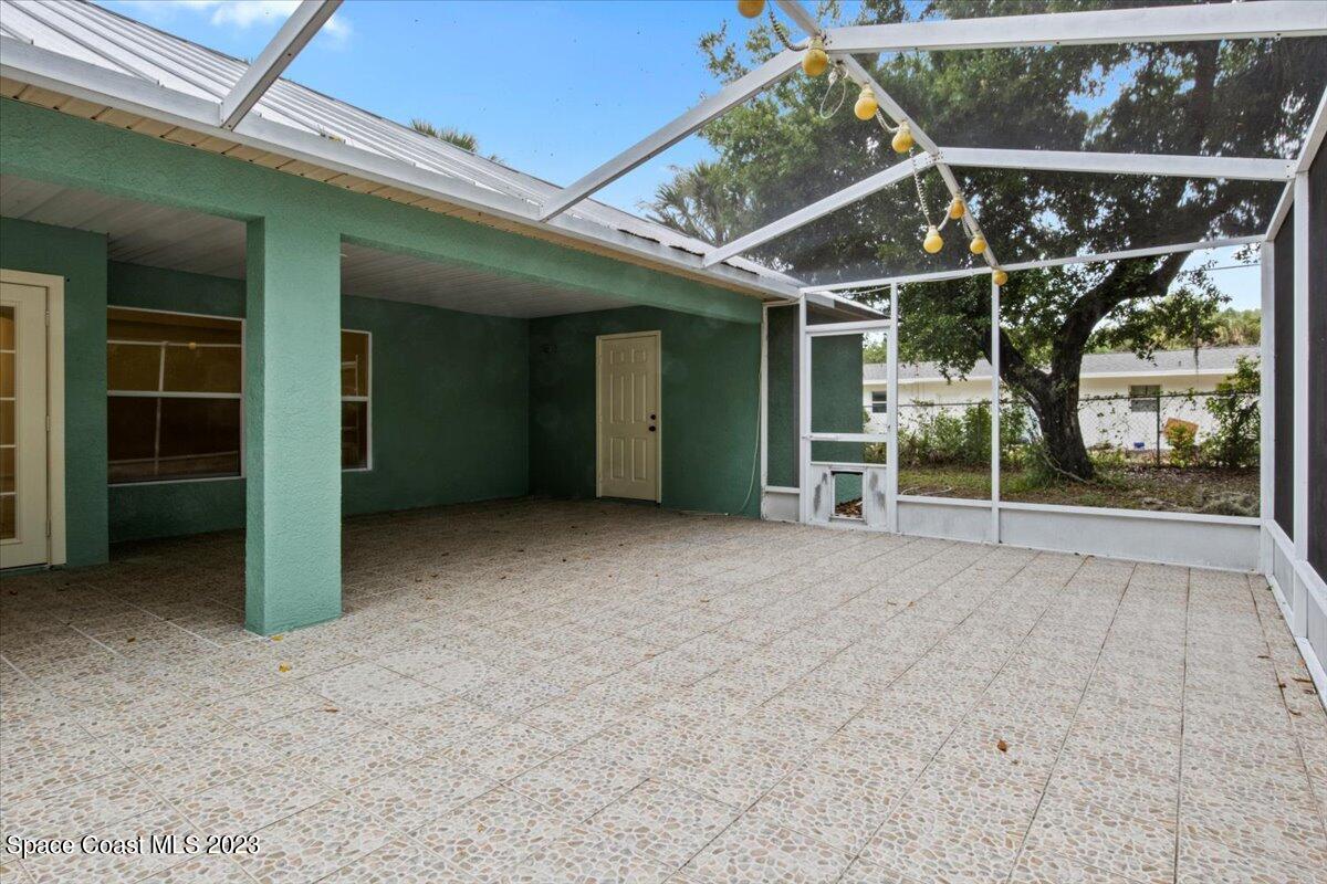 2405 Ruffner Road Melbourne, FL 32901 - Photo 29 of 35 an empty room with windows