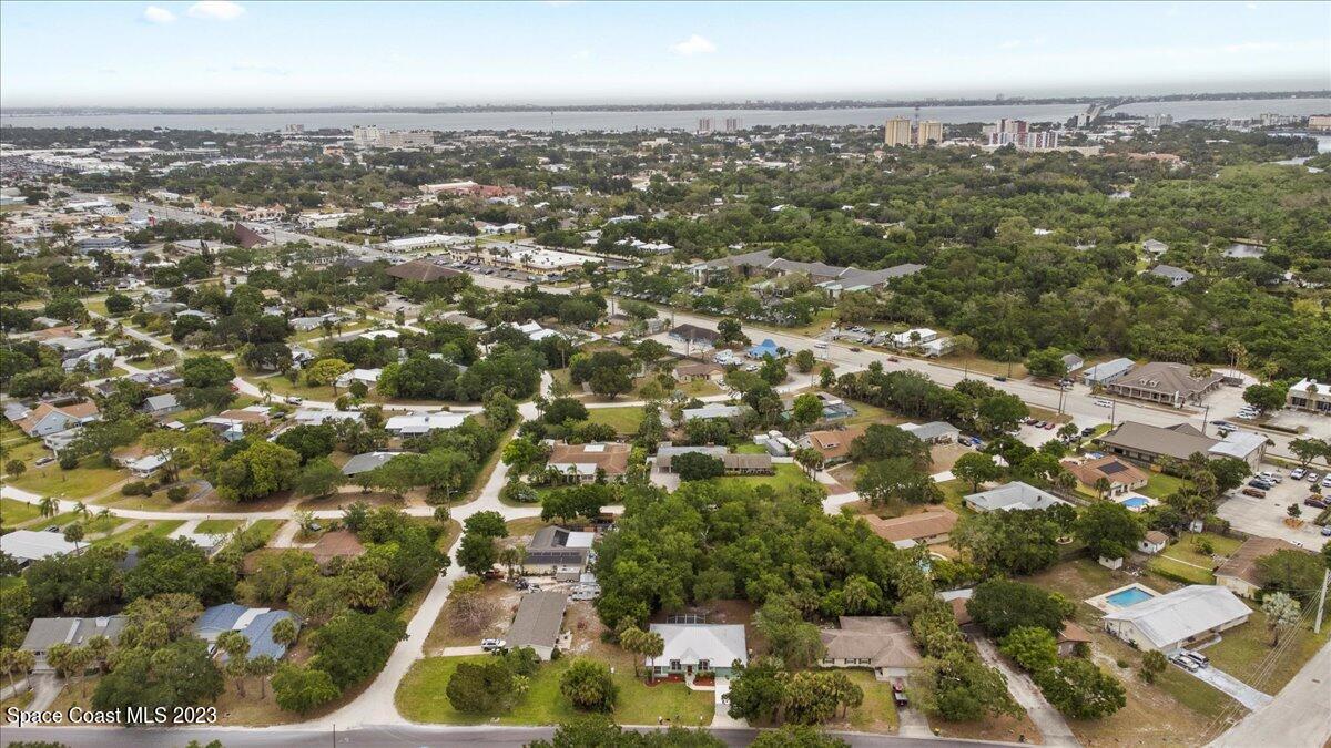 2405 Ruffner Road Melbourne, FL 32901 - Photo 33 of 35 an aerial view of residential building with green space