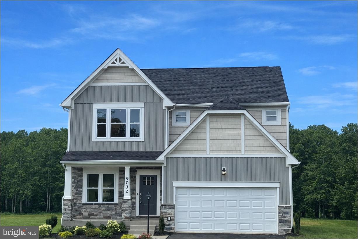 15205 Woodland Church Road Culpeper, VA 22701 - Photo 1 of 25 a front view of a house with a yard
