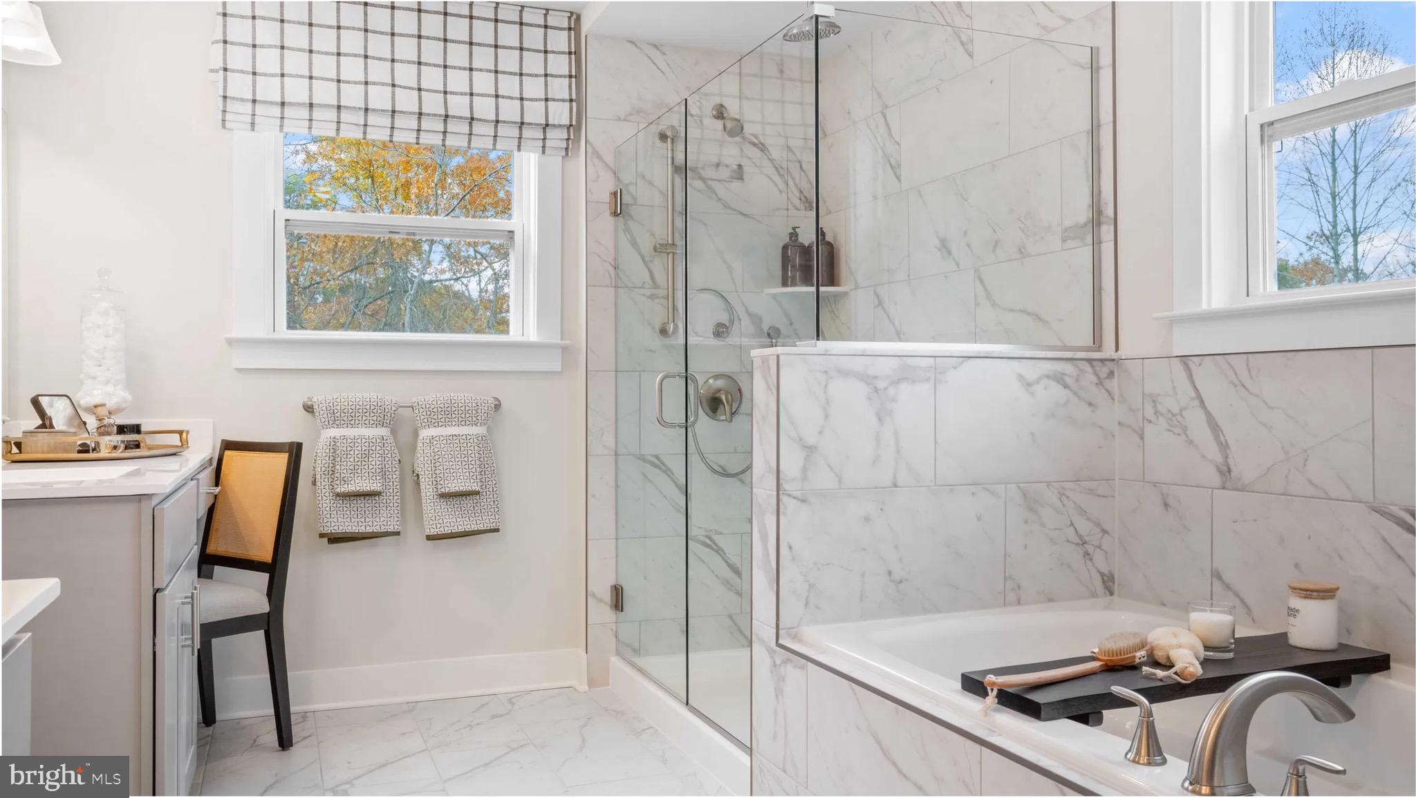 15205 Woodland Church Road Culpeper, VA 22701 - Photo 22 of 25 a bathroom with a sink and a shower