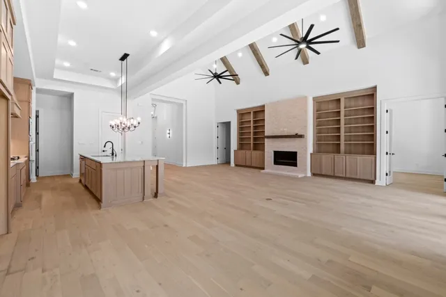 a view of a livingroom with a kitchen