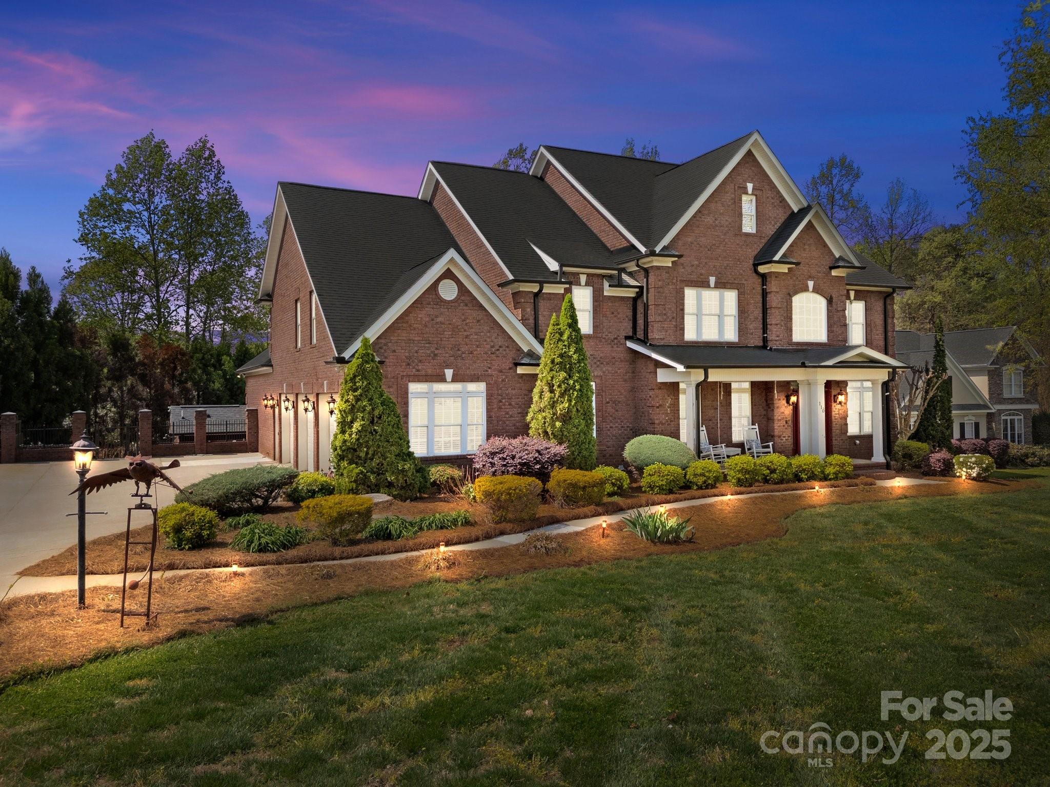 110 Devonshire Lane Salisbury, NC 28146 - Photo 1 of 48 a front view of a house with a garden