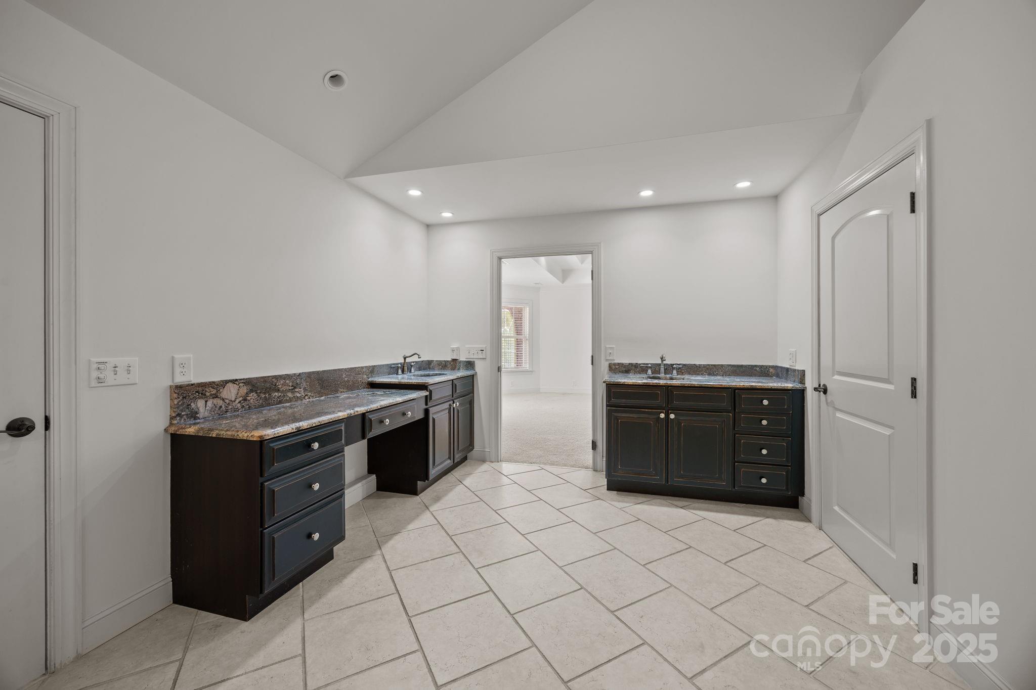 110 Devonshire Lane Salisbury, NC 28146 - Photo 24 of 48 a kitchen with stainless steel appliances granite countertop a stove and a refrigerator