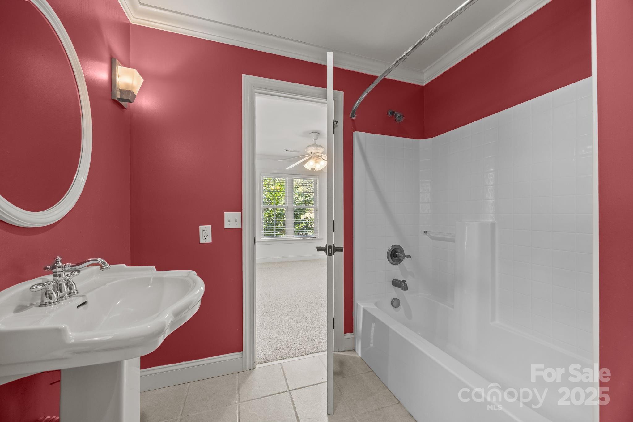 110 Devonshire Lane Salisbury, NC 28146 - Photo 30 of 48 a bathroom with a sink and a mirror