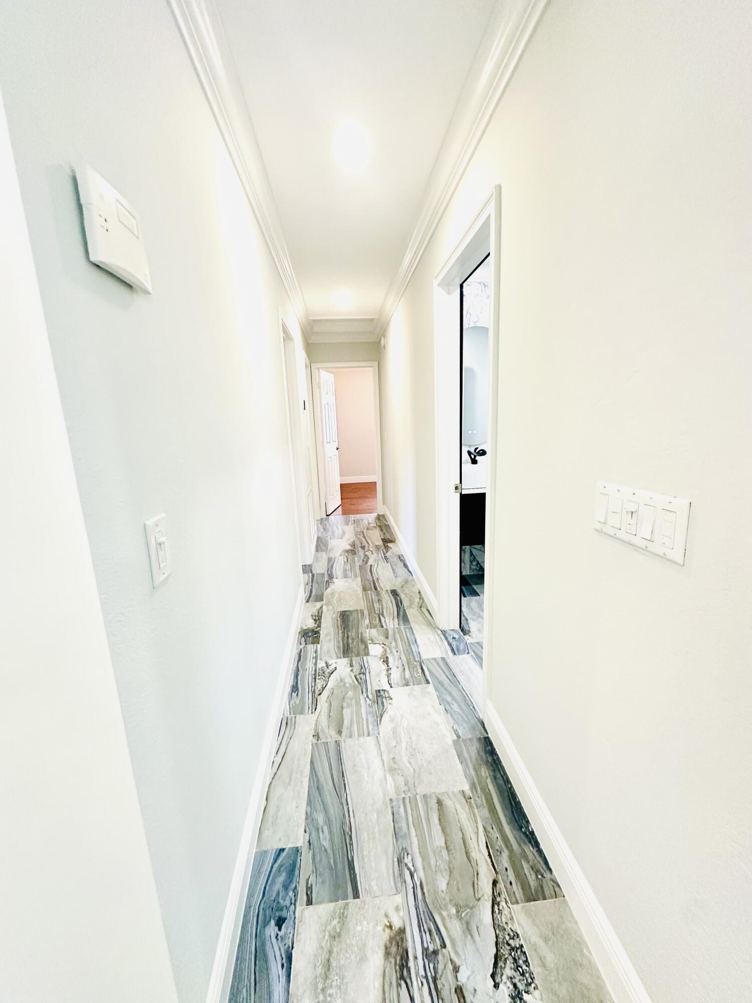 1104 Neoga Street Jupiter, FL 33458 - Photo 11 of 21 a view of a hallway