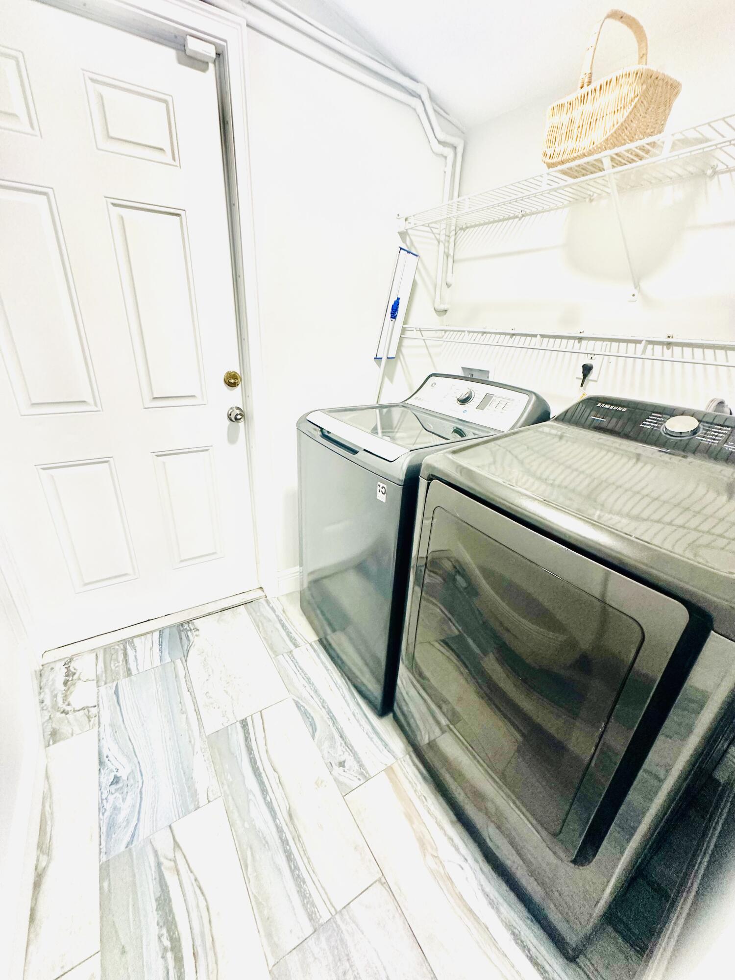 1104 Neoga Street Jupiter, FL 33458 - Photo 21 of 21 a utility room with a sink