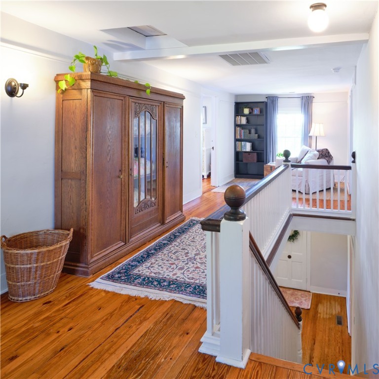 4970 Mt Landing Road Tappahannock, VA 22560 - Photo 17 of 48 a view of a hallway with furniture and wooden floor