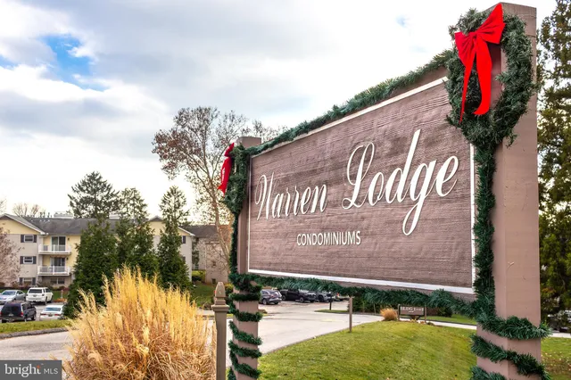 a sign that is on a brick wall