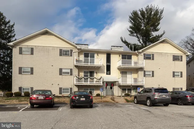 a car parked in front of a house