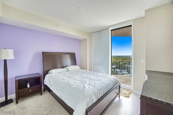 a bathroom with a double vanity sink toilet and shower