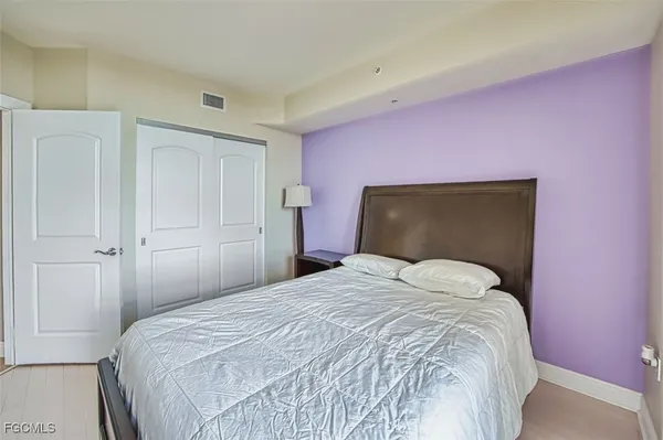 a bathroom with a double vanity sink toilet tub and view