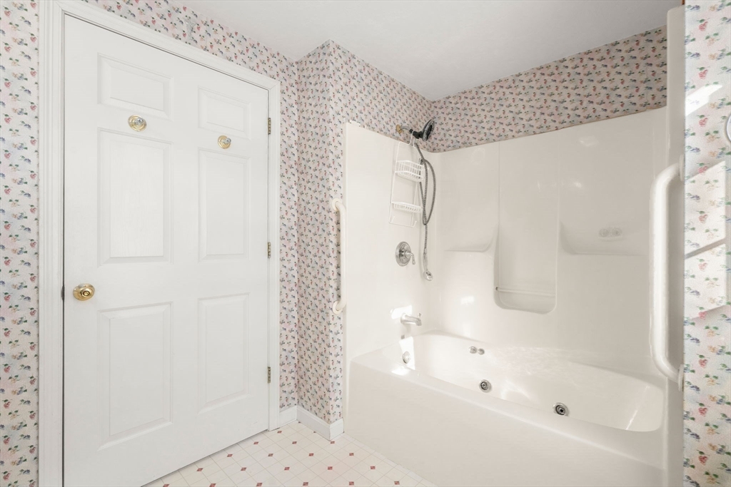 53-55 Point Pleasant Road Webster, MA 01570 - Photo 12 of 42 a bathroom with a bathtub and a shower