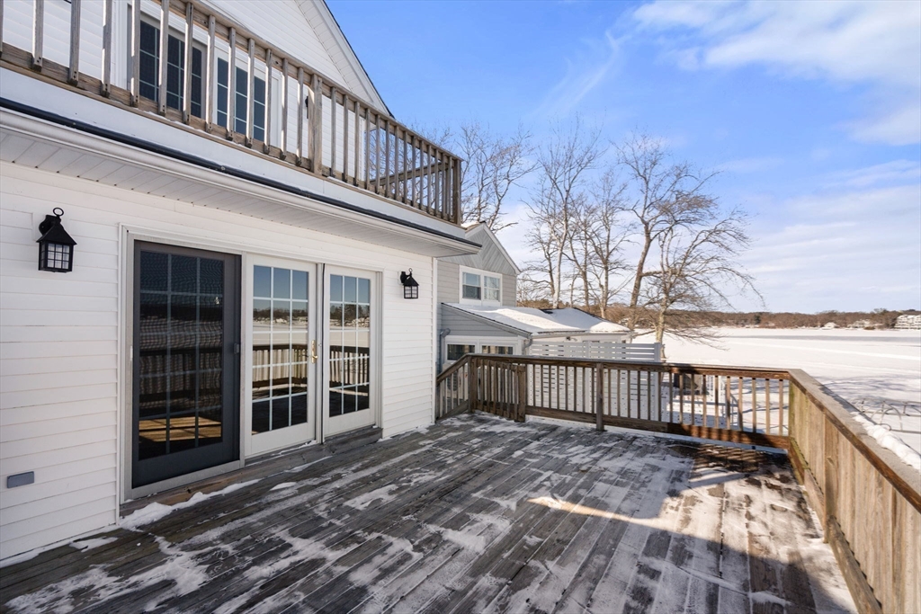 53-55 Point Pleasant Road Webster, MA 01570 - Photo 23 of 42 a view of a house with backyard and deck