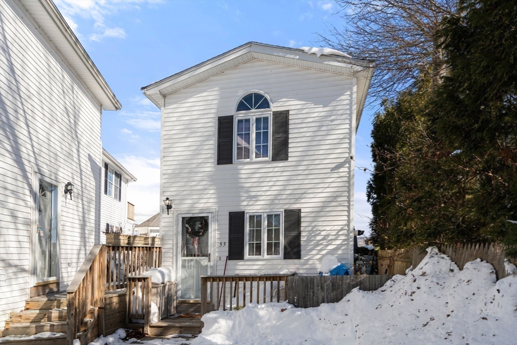 53-55 Point Pleasant Road Webster, MA 01570 - Photo 26 of 42 a view of a house with a yard