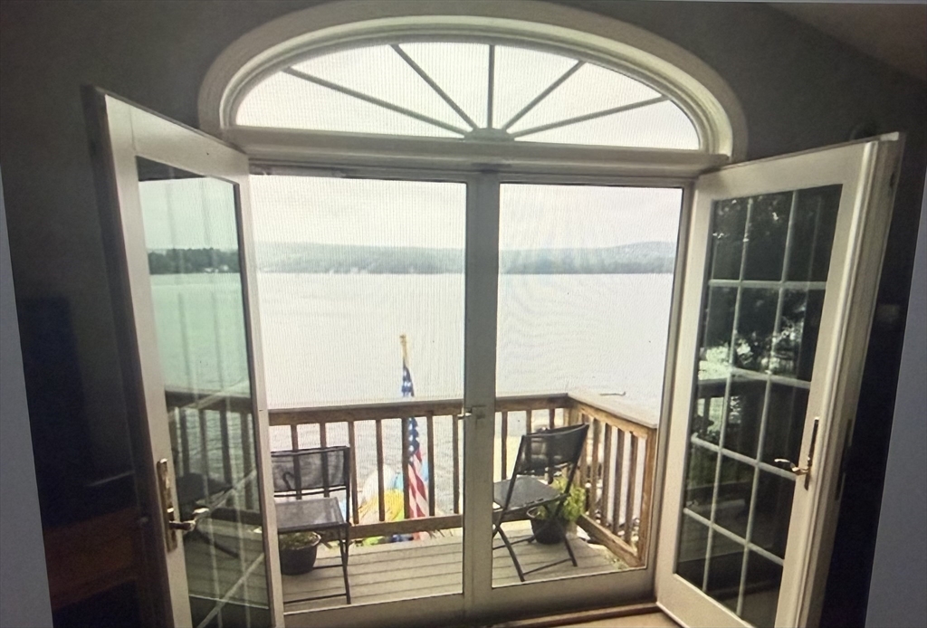 53-55 Point Pleasant Road Webster, MA 01570 - Photo 31 of 42 a view of staircase with railing and wooden floor