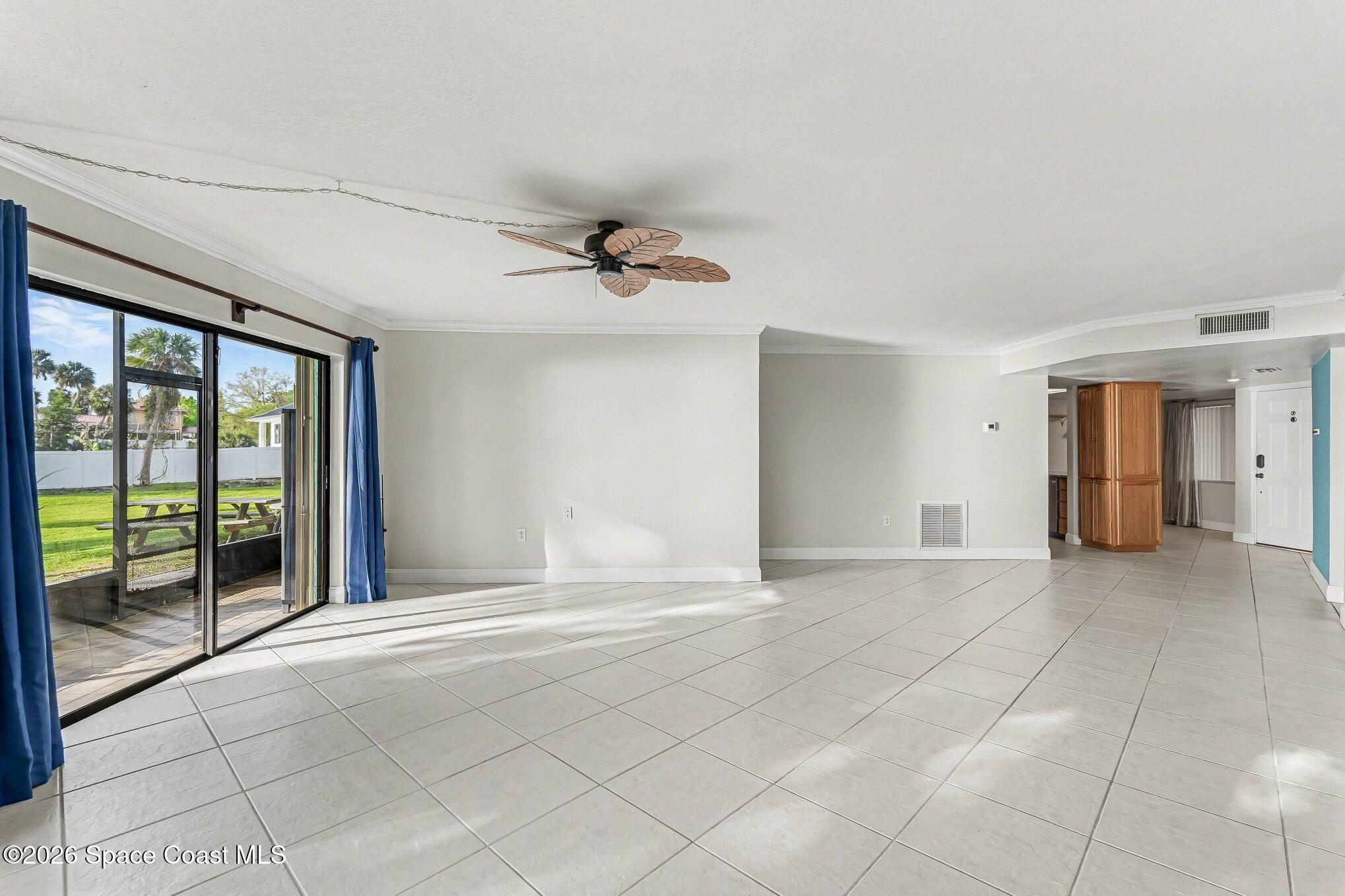 100 Canebreakers Drive, Unit 108 Cocoa, FL 32927 - Photo 3 of 17 a view of an empty room with a window