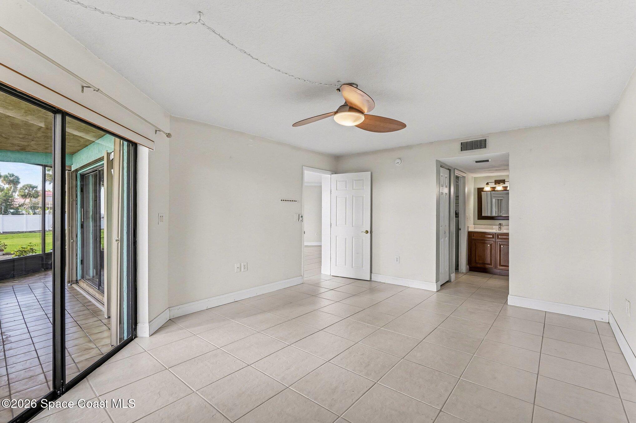 100 Canebreakers Drive, Unit 108 Cocoa, FL 32927 - Photo 10 of 17 a view of a hallway to rooms and stairs